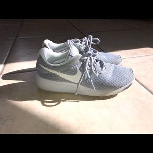 Grey Nike Tanjun shoes
